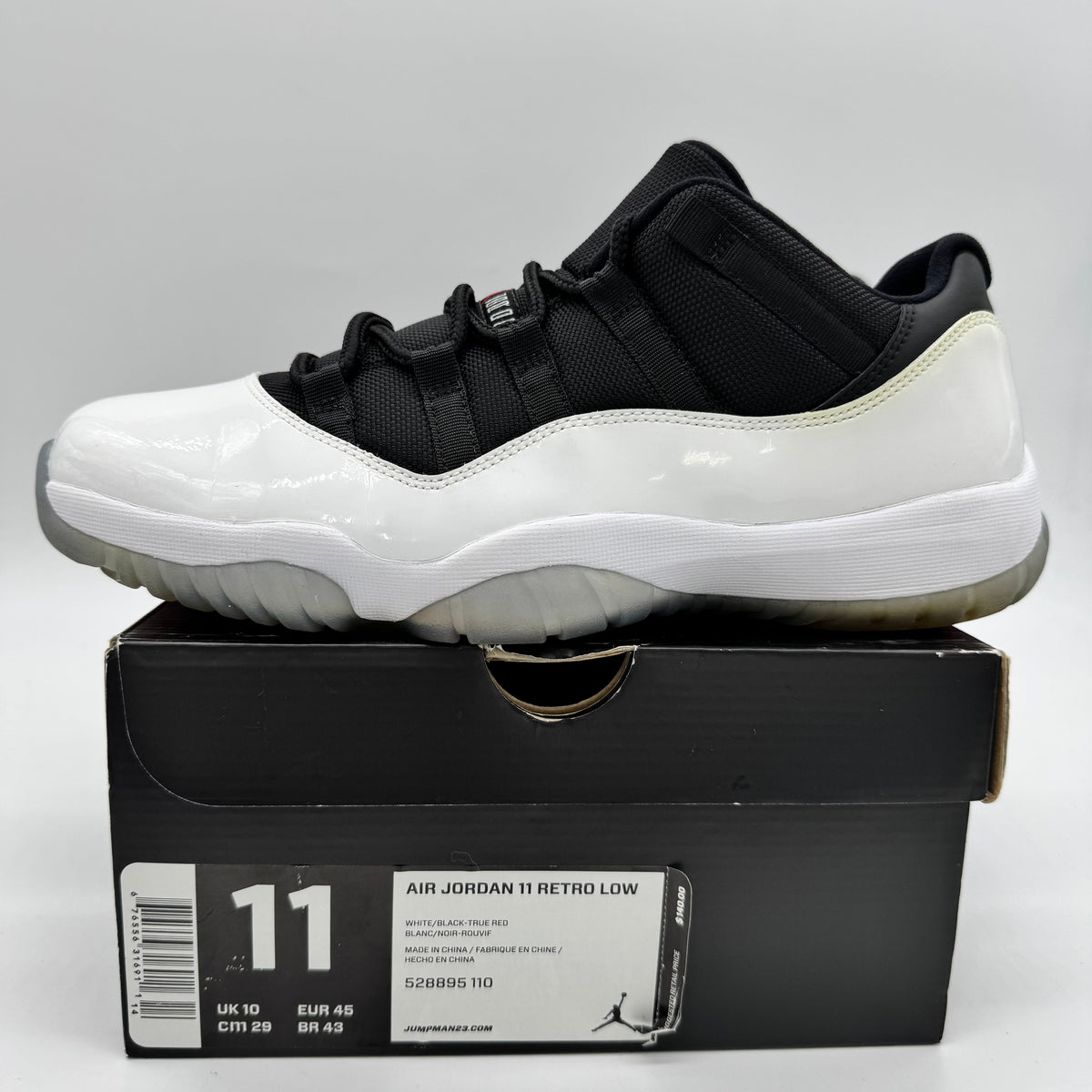 Jordan 11 Low Tuxedo