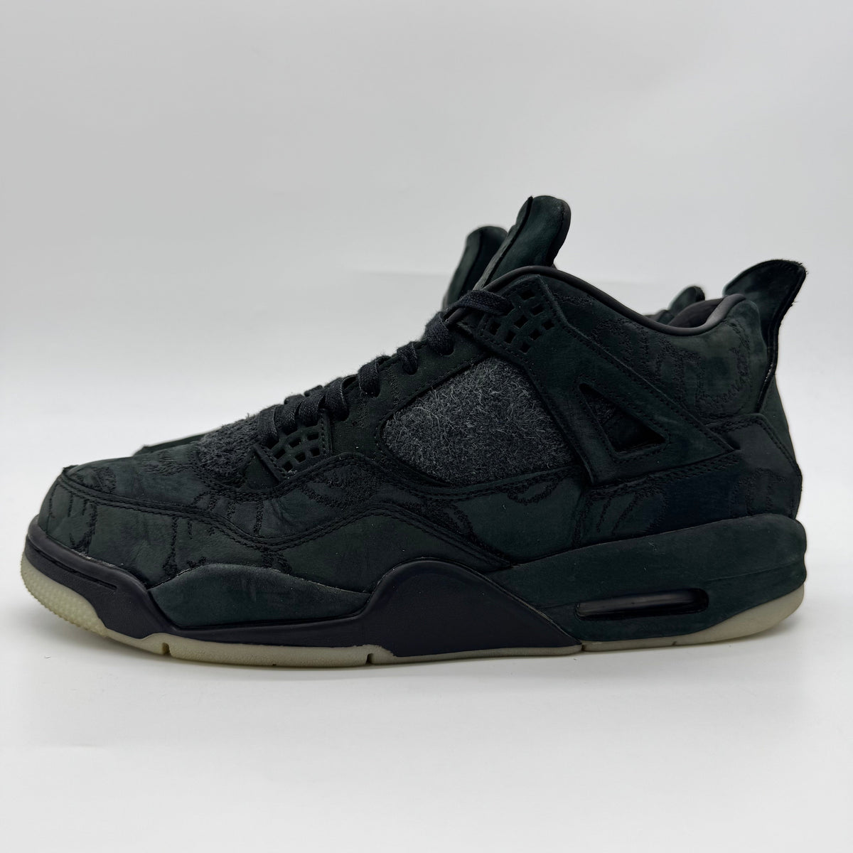 Jordan 4 Kaws Black